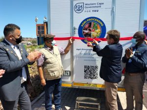 Executive Mayor Roelof Strydom of the West Coast District Municipality cuts the ribbon