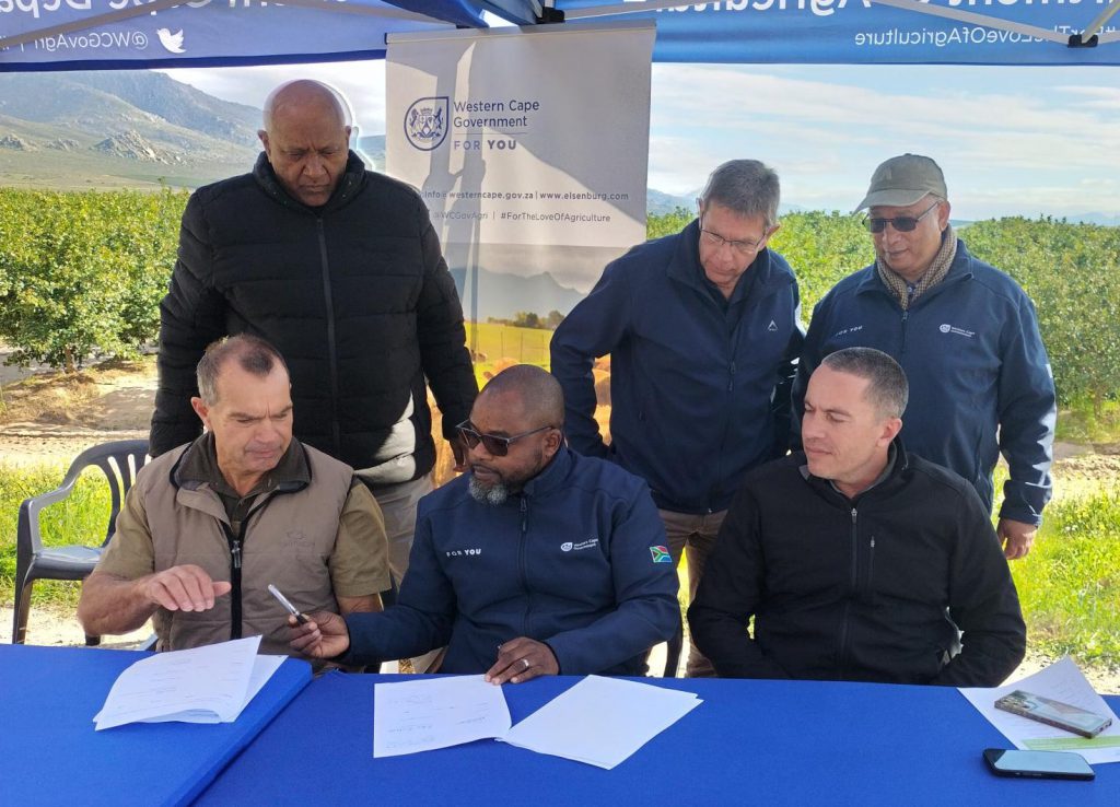 Front row: L-R - Mr Jannie Toerien - (Citrusdal Water Users Association); Dr Mogale Sebopetsa ( Head of Department: WC DoA); Stefan Theron (Citrusdal Water Users Association)