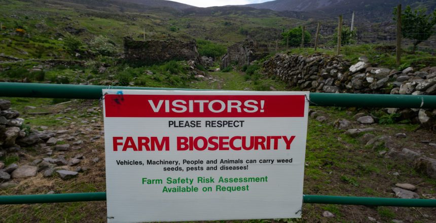 Farm biosecurity warning sign at the gate of a rural farm in county Kerry, Ireland