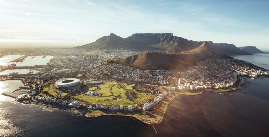 Aerial view of Cape Town with Cape Town Stadium, Lion's Head and Table mountain.